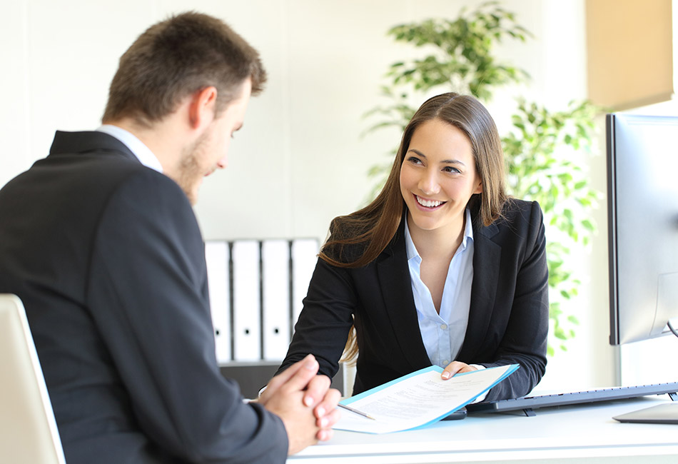 Businesspeople reviewing documents