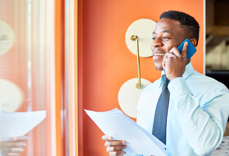 African American business man talking on cell phone