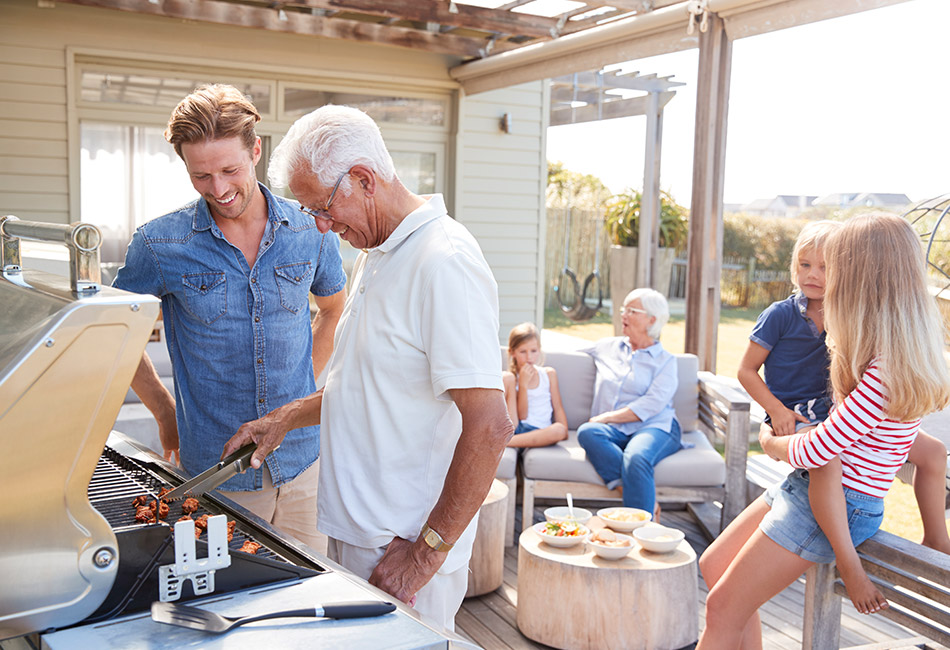 Caucasian family barbequing