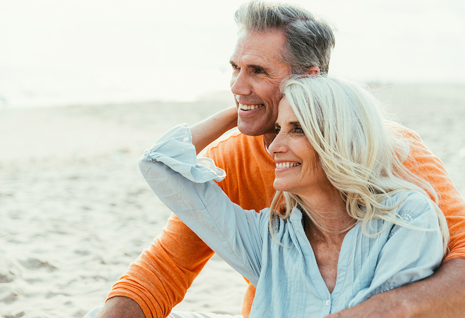 Caucasian couple by the water