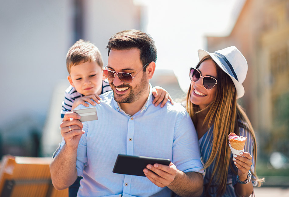 Young family with debit card 