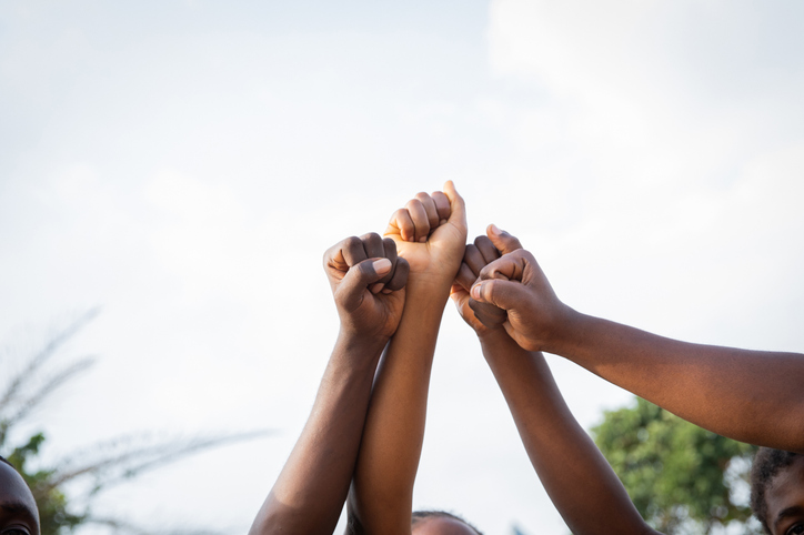 african american fists in the air