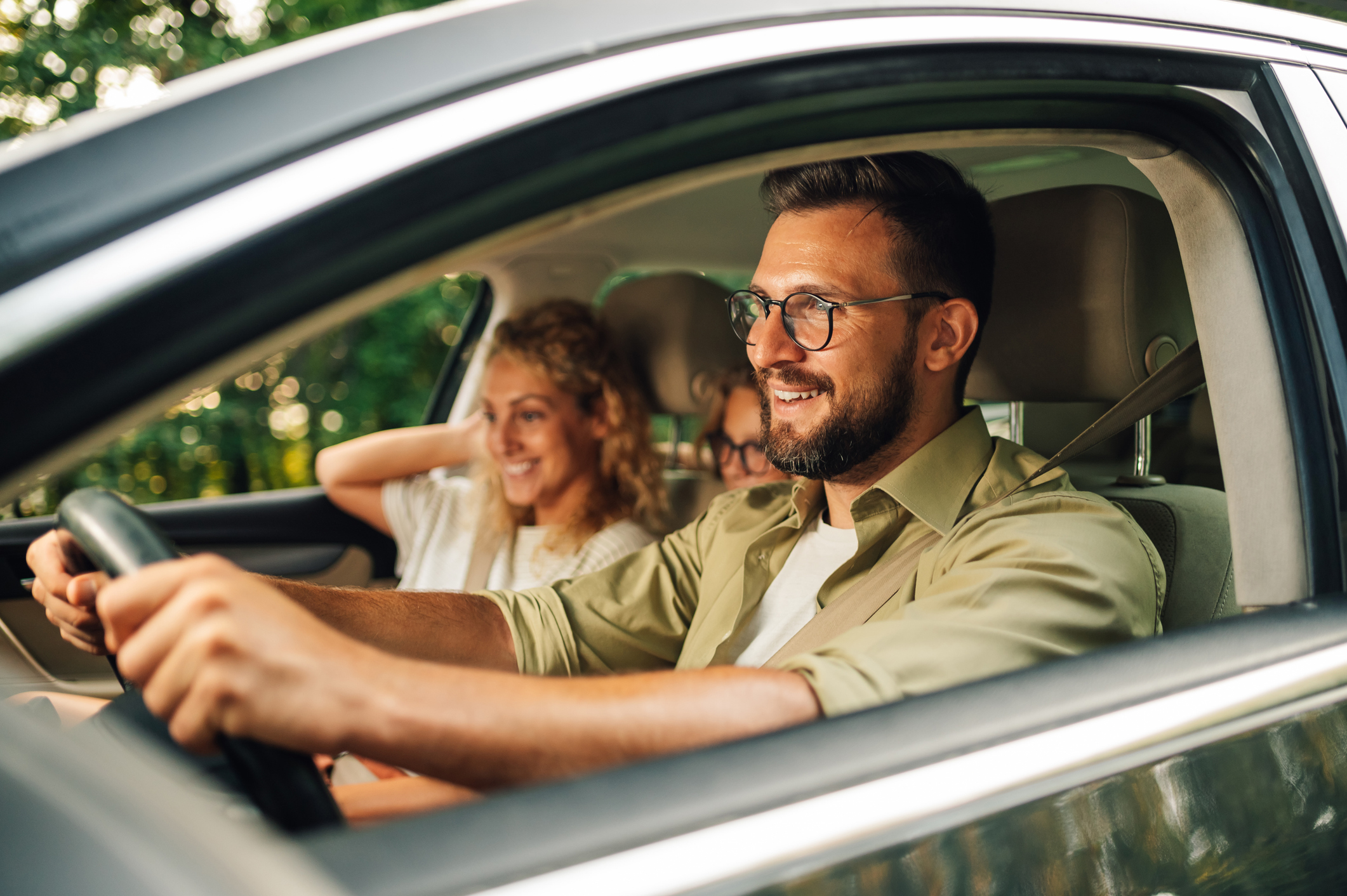 family driving in car