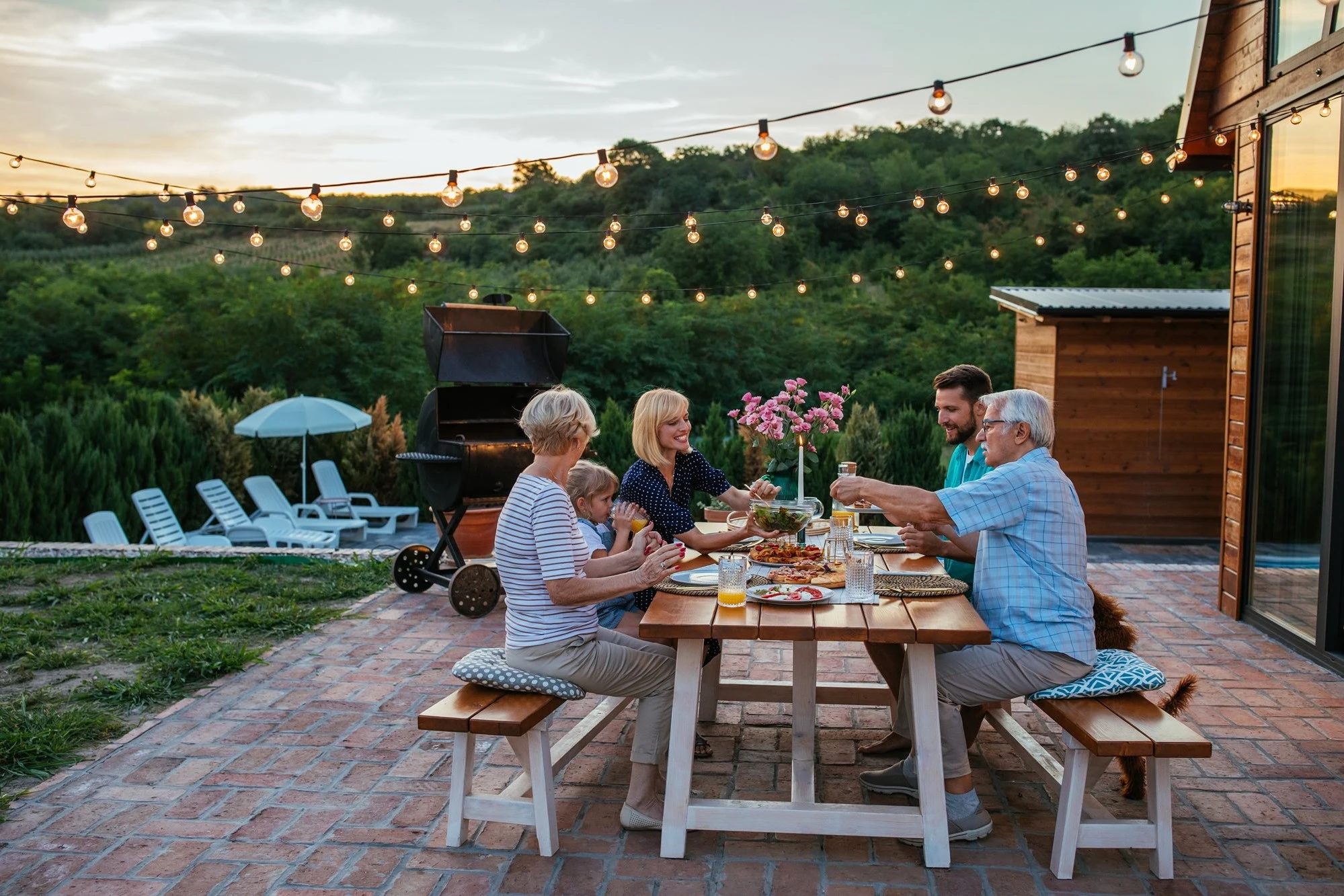 family at table outside