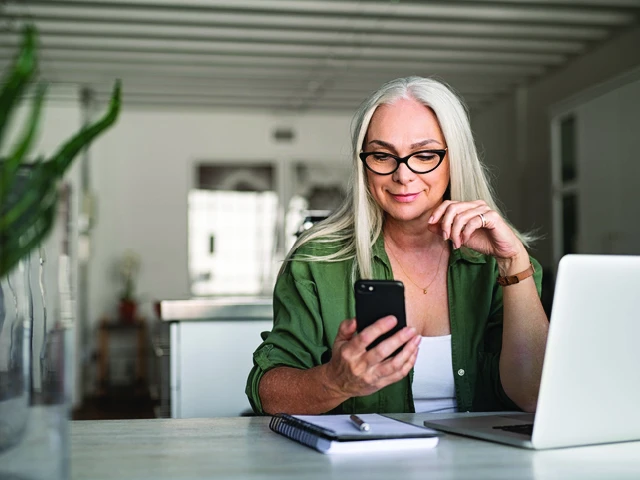 caucasian woman looking at cell phone