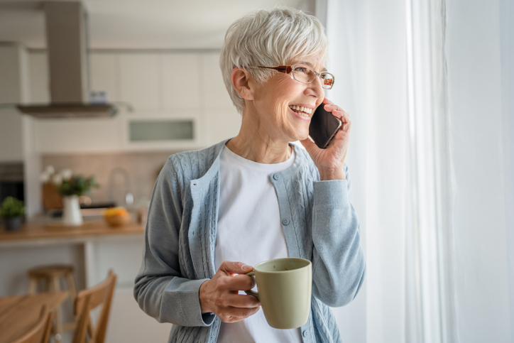 caucasian woman talking on cell phone