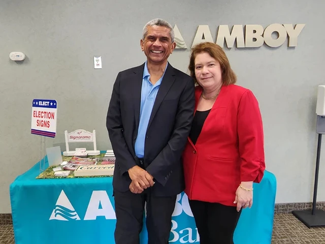 Rama from Signarama with Amboy Bank Freehold branch manager, Norma Alicea